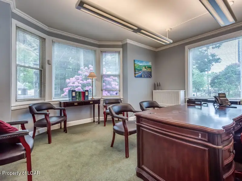 Versatile Office Building in Central Kingston with Multiple Offices and Ample Parking