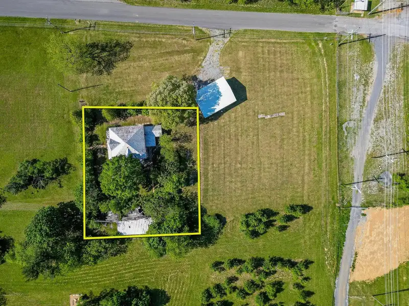 Classic American Foursquare Home in Need of Restoration with Detached Garage