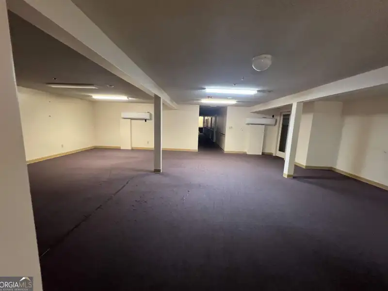 Two-level Commercial Unit with 26 Living/office Spaces in Re-zoned R4 Area