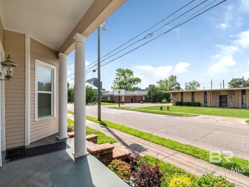Mixed-use Property in Downtown Mobile, Alabama with High Ceilings and Hardwood Floors