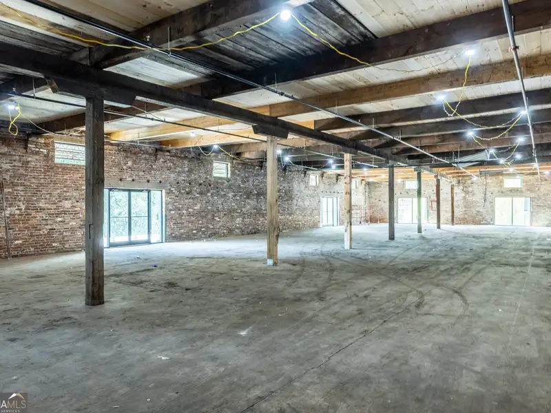 Renovated Cotton Warehouse with Buildout and Unique Features in Prime Location