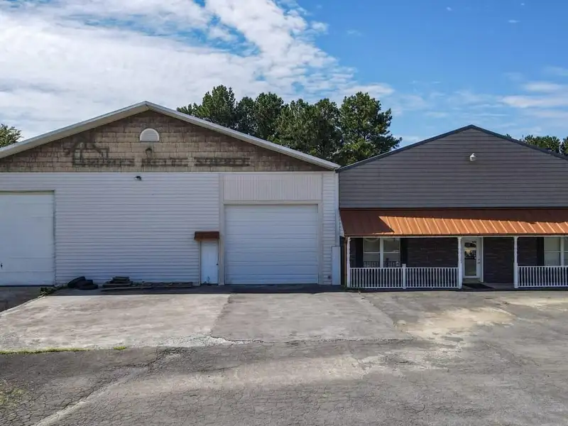 Commercial Property on Busy Highway - 2.1 Acres, 31,000 Sq Ft with Offices and Roll-up Doors