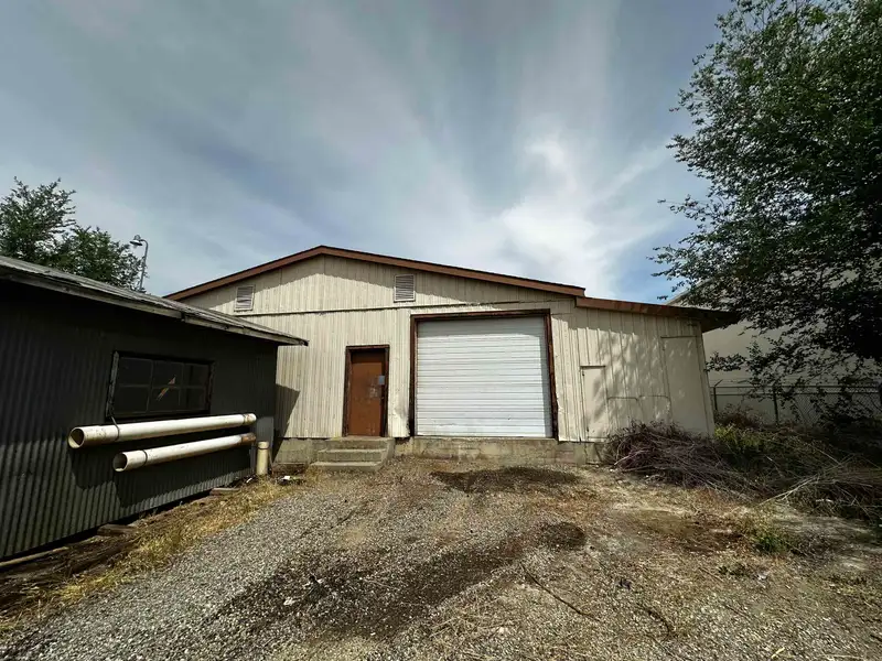 Warehouse with Gated Yard and Office Space in High Visibility Location