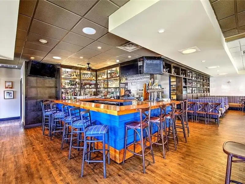 Mixed-use Property in Hope Village: Restaurant, 4 Residential Units, 3 Commercial Spaces