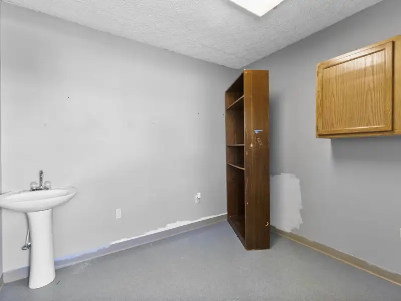 Versatile 4,305 Sq Ft Office Building with Apartment on Highway 11e