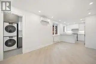 Renovated 2nd Floor Condo in Mid-town Toronto with Luxury Finishes and Modern Amenities
