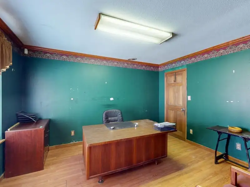 Commercial Property on Busy Highway - 2.1 Acres, 31,000 Sq Ft with Offices and Roll-up Doors