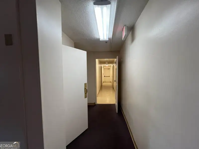 Two-level Commercial Unit with 26 Living/office Spaces in Re-zoned R4 Area