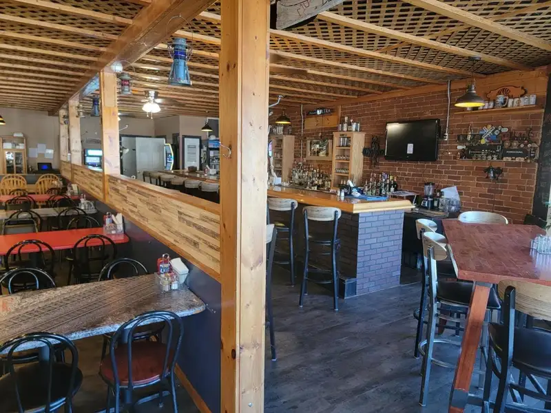Investment Opportunity: Restaurant with Apartment and Additional Parking Near I-74