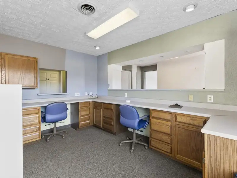 Versatile 4,305 Sq Ft Office Building with Apartment on Highway 11e