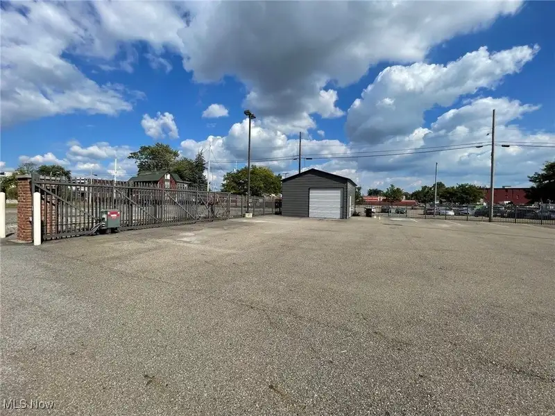 Well-maintained Two-story Brick Building with Retail and Workshop Space in Ne Location