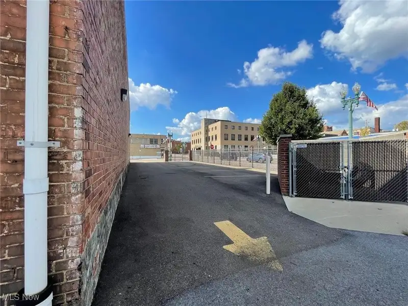 Well-maintained Two-story Brick Building with Retail and Workshop Space in Ne Location