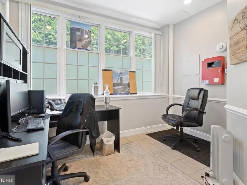 Historic 1921 Office Building in Wallingford with Ample Parking and Strong Investment Potential