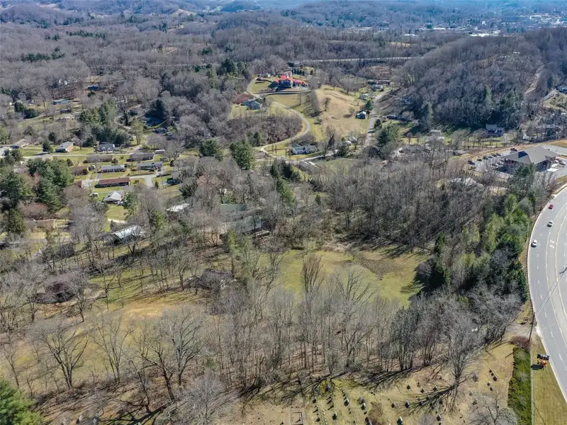 9.29 Acre Multi-family or Commercial Parcel in Waynesville Etj with City Utilities