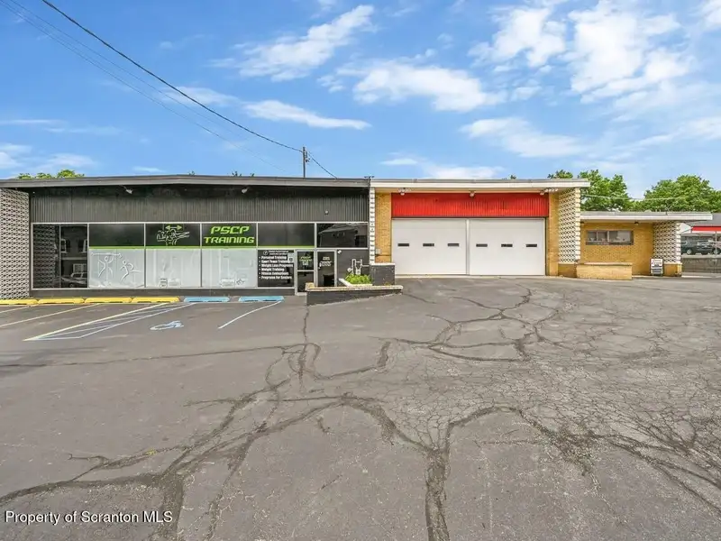 Mixed-use Building with Retail Space and Parking for Sale in Prime Location