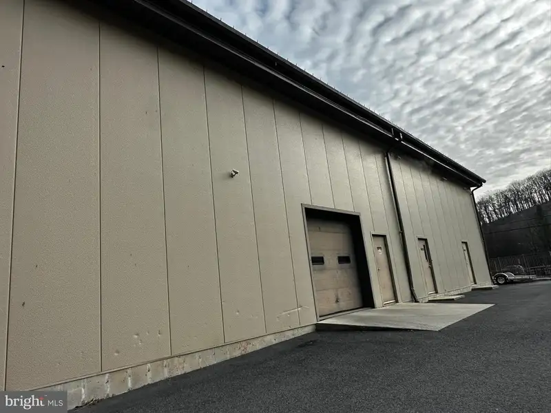 Versatile Commercial Property with Showroom, Offices, and Large Metal Building in Prime Location