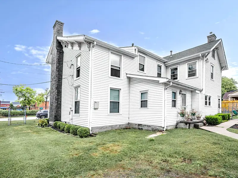 Historic 1850s Two-story Home in Central Business District of Versailles