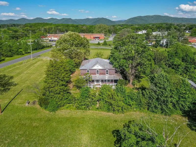 Classic American Foursquare Home in Need of Restoration with Detached Garage