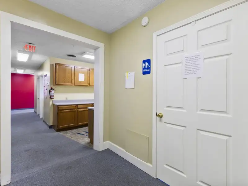Versatile 4,305 Sq Ft Office Building with Apartment on Highway 11e