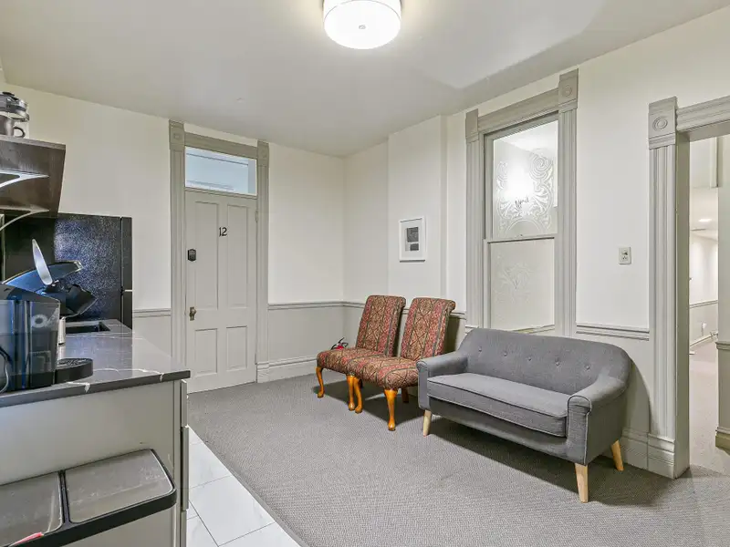 Historic Office Building in Denver's Uptown with 21 Offices and Modern Amenities
