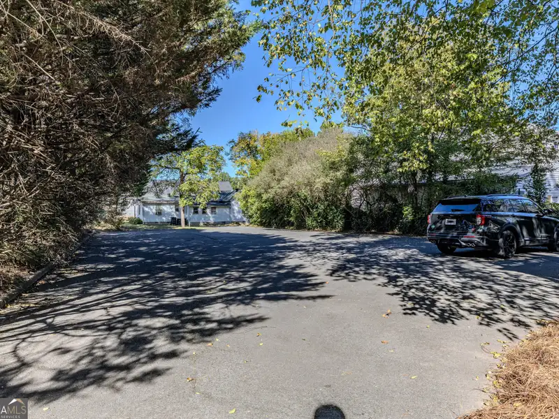 Versatile Commercial Building Near Downtown with Parking and Apartment Potential