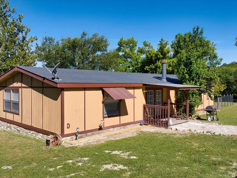10-acre Mobile Home Community with 5 Units, Fenced, Workshop, and Growth Potential