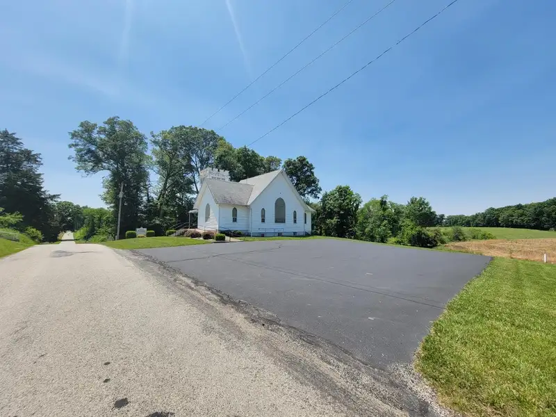 Charming Country Church with Stained Glass, Pristine Woodwork, and Redevelopment Potential