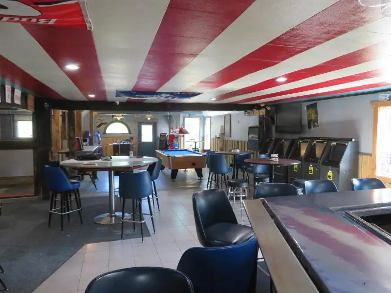 Turnkey Bar/restaurant with Apartment, Highway Access, and Development Potential in Northwoods