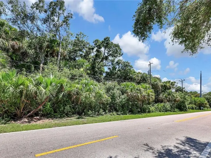 Commercial Corner Lot with Existing Residence in Lakewood Park, 31,140 Sq Ft
