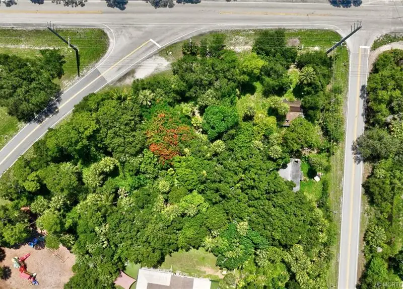 Commercial Corner Lot with Existing Residence in Lakewood Park, 31,140 Sq Ft