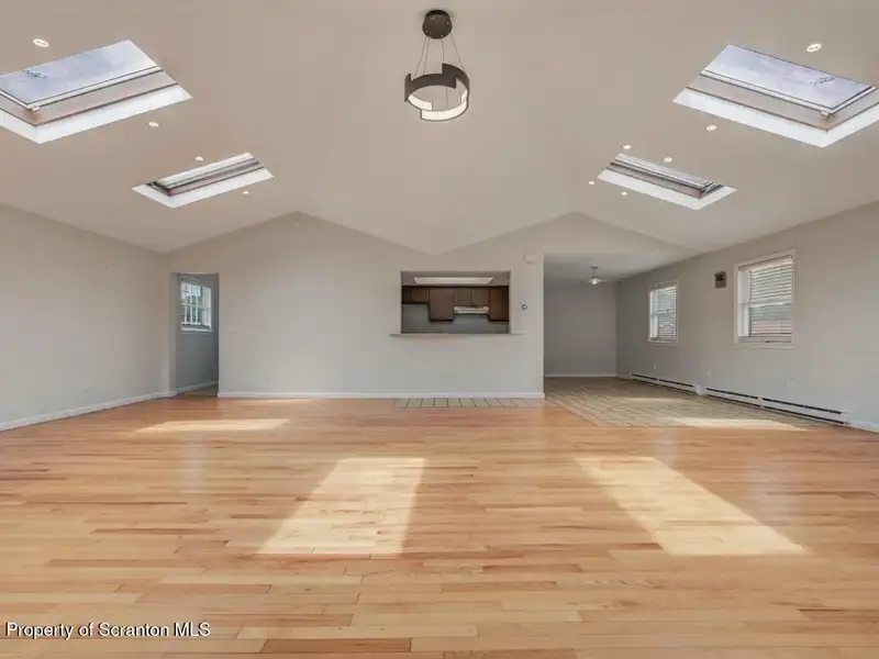 Mixed-use Property in Throop: 7-bay Garage and Updated 2-bedroom Apartment