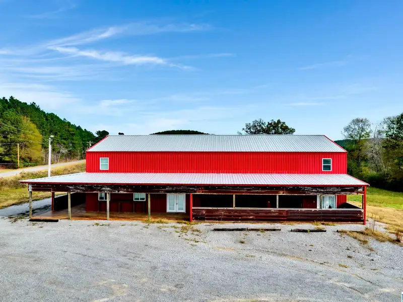 Prime Commercial Property Near Smith Lake with 3,800 Sq Ft Building and Billboard Income