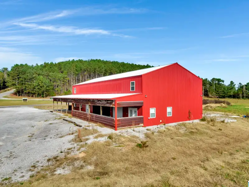 Prime Commercial Property Near Smith Lake with 3,800 Sq Ft Building and Billboard Income