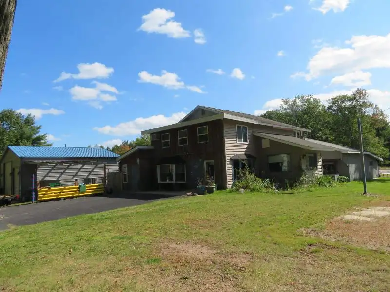 Turnkey Bar/restaurant with Apartment, Highway Access, and Development Potential in Northwoods