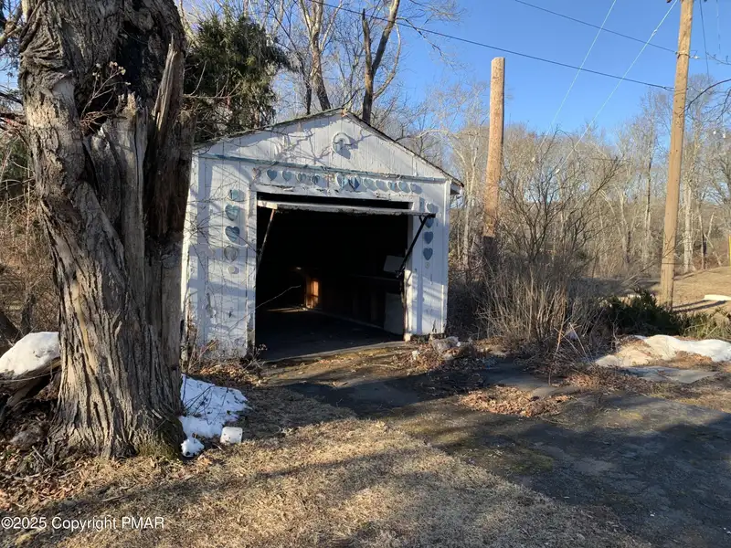 Prime 2-acre Commercial Property with 3-bedroom Home in High Traffic Area