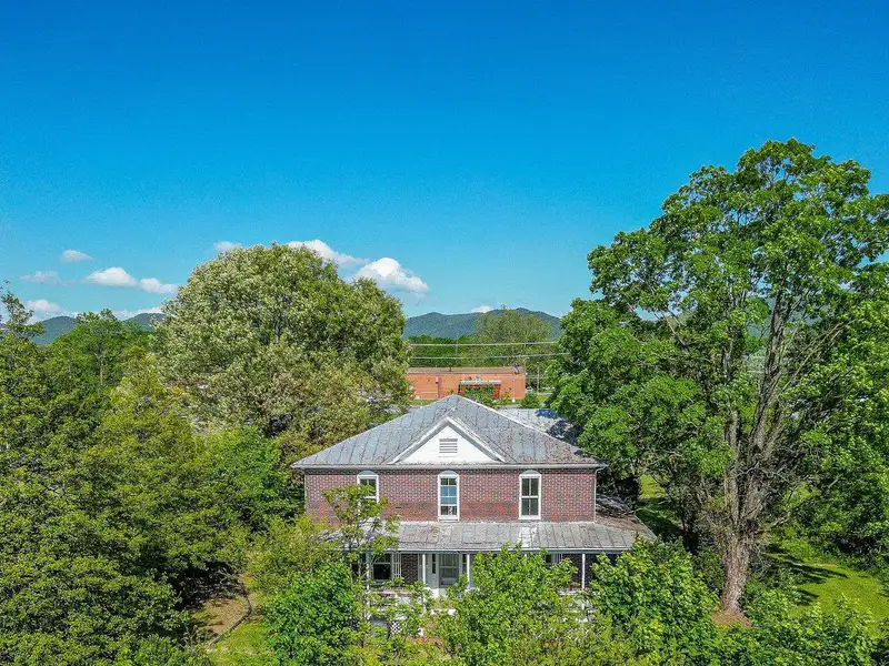 Classic American Foursquare Home in Need of Restoration with Detached Garage
