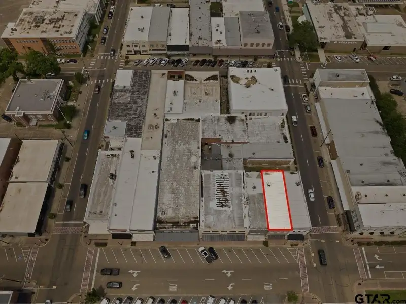Unfinished Downtown Commercial Building with High Traffic Visibility and Mixed-use Potential