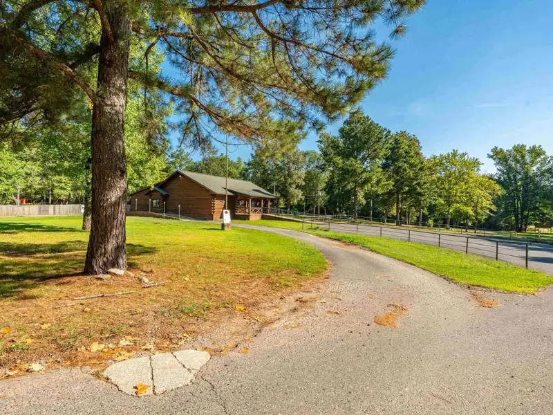 Established Log Cabin Liquor Store for Sale on Highway 70 with Drive-through Access
