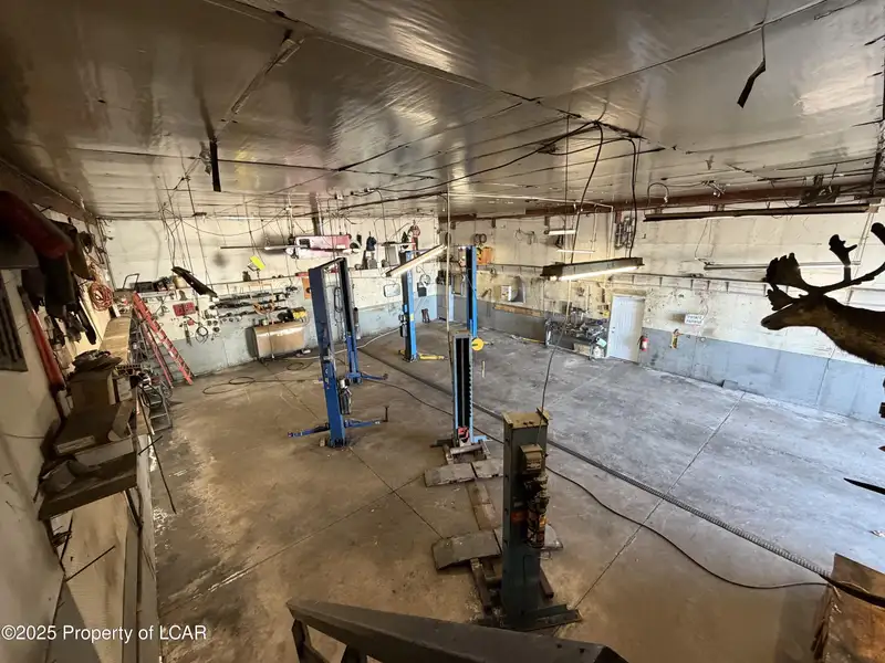 For Lease: 2,400 Sf Garage/warehouse with Office and Three Vehicle Lifts