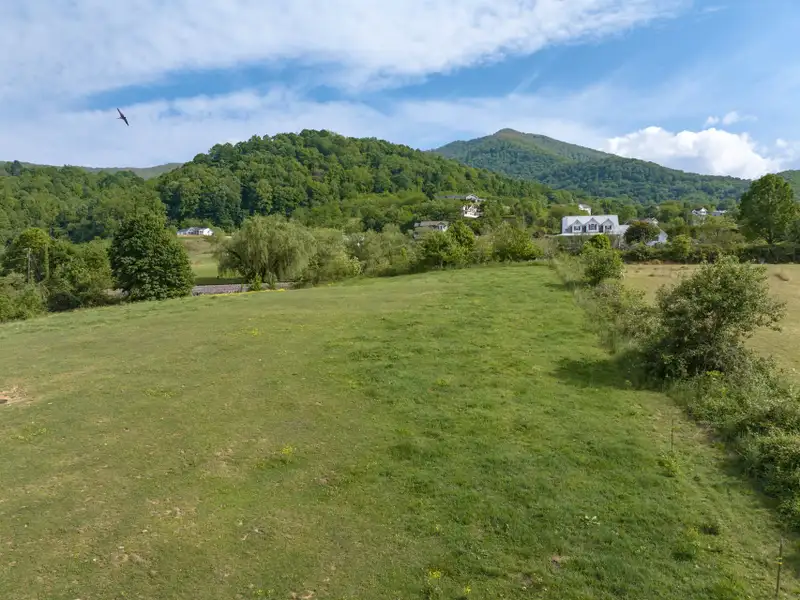 Historic 1918 Stone Building with 3.99 Acres and Detached Workshop in Balsam Road Area