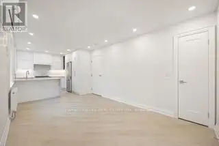 Renovated 2nd Floor Condo in Mid-town Toronto with Luxury Finishes and Modern Amenities