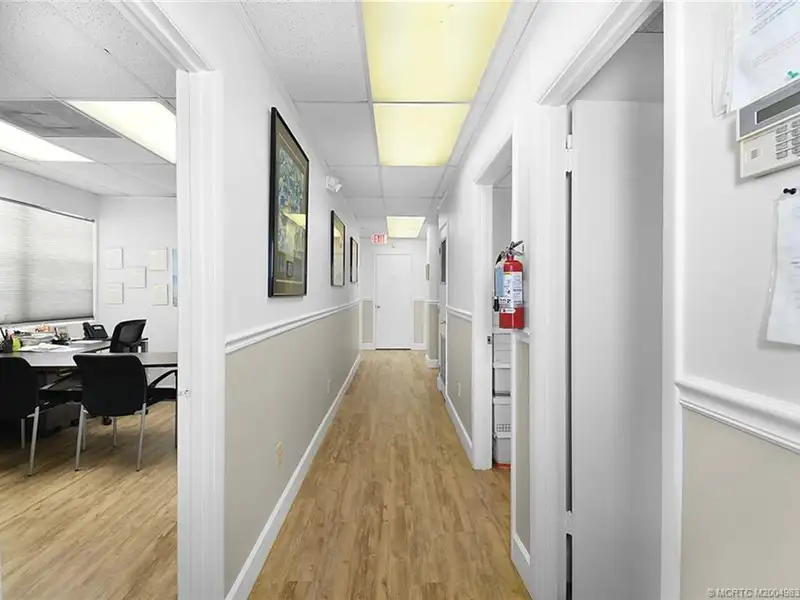 Versatile Office Building with Therapy Rooms and Break Area in R-3a Zoning