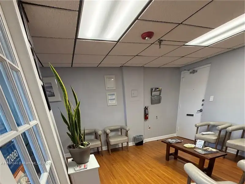 Well-maintained Office Space Near Coral Gables with Natural Light and Three Private Rooms