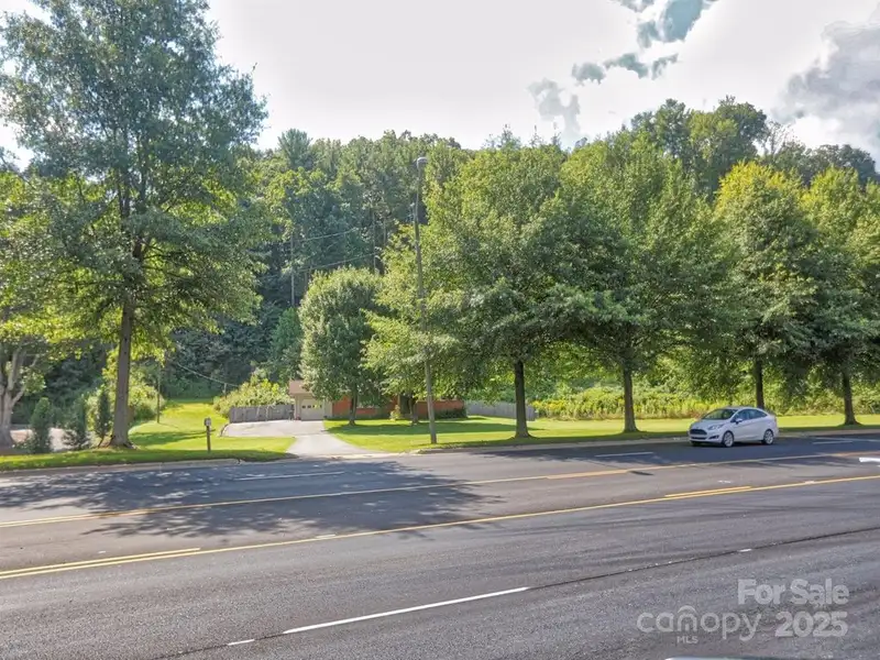 Prime 1.8 Acre Commercial Property with Home in Waynesville, Nc on Major Corridor