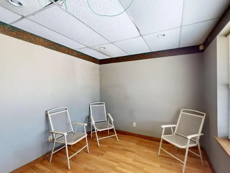 Commercial Property on Busy Highway - 2.1 Acres, 31,000 Sq Ft with Offices and Roll-up Doors
