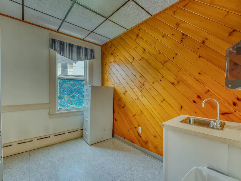 Versatile Mixed-use Property on Cottage Street, Littleton with Office Spaces and Barn