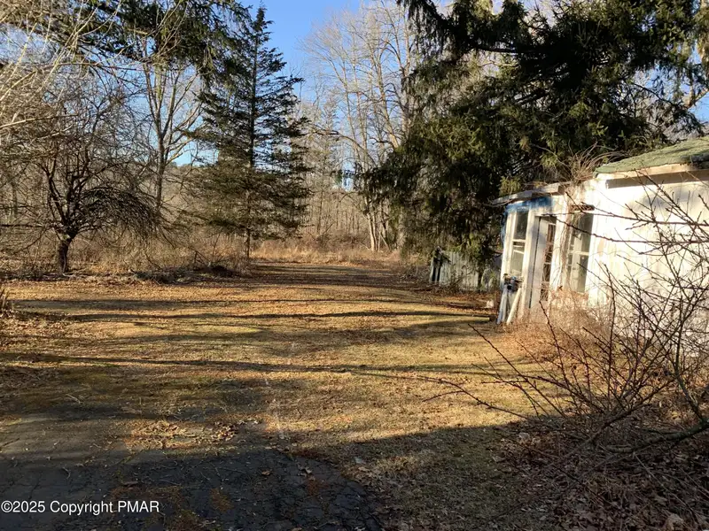 Prime 2-acre Commercial Property with 3-bedroom Home in High Traffic Area