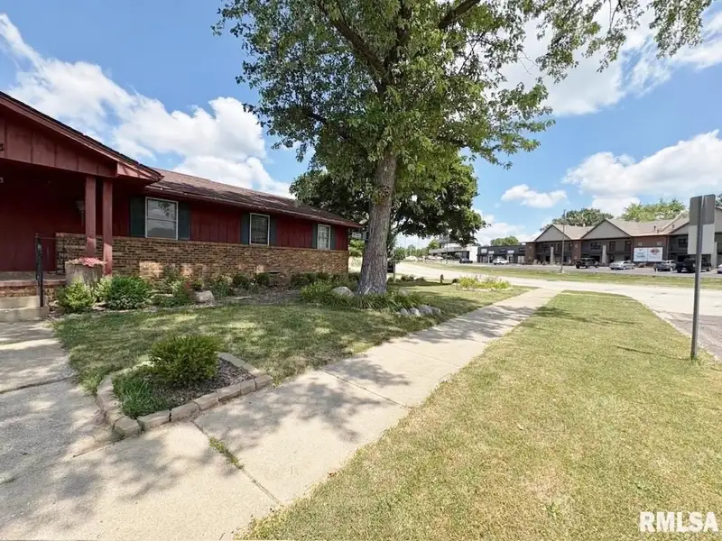 Versatile C-1 Zoned Property with 4 Bedrooms in Northwest Peoria Corner Lot