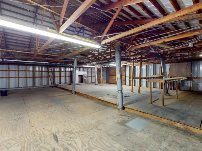 Commercial Property on Busy Highway - 2.1 Acres, 31,000 Sq Ft with Offices and Roll-up Doors