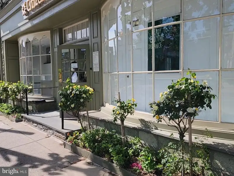 Historic Multi-use Building in Chestnut Hill Business District with Retail and Residential Units